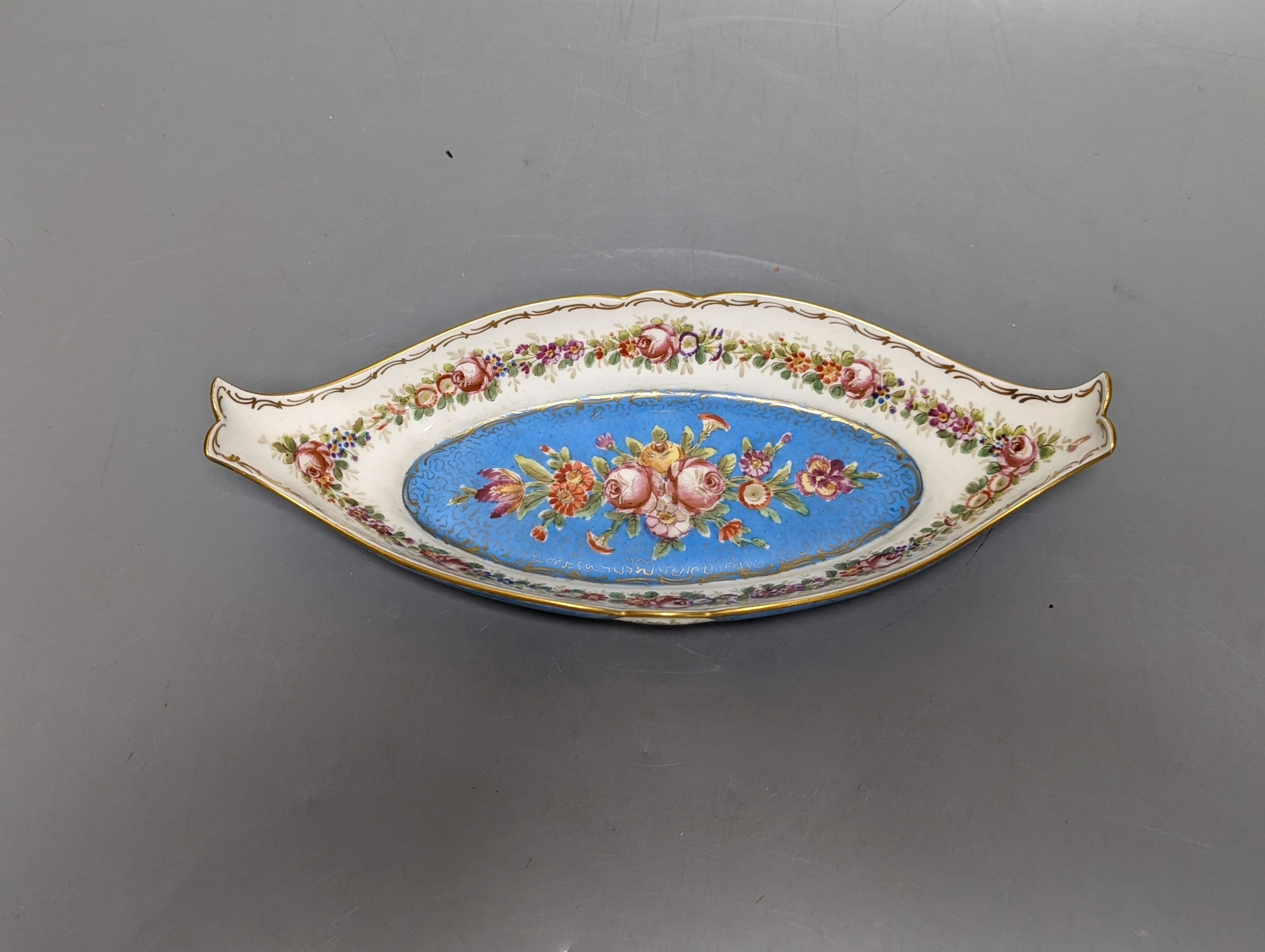A Sevres style boat shaped dish and a Limoges circular dish, Sevres dish 27 cms wide & Limoges dish 31 cms diameter.